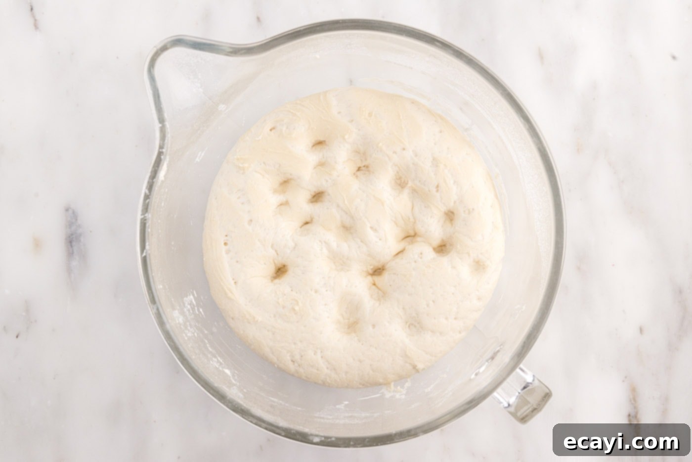 The Perfect Cast-Iron Loaf 10 hole marks in bread dough