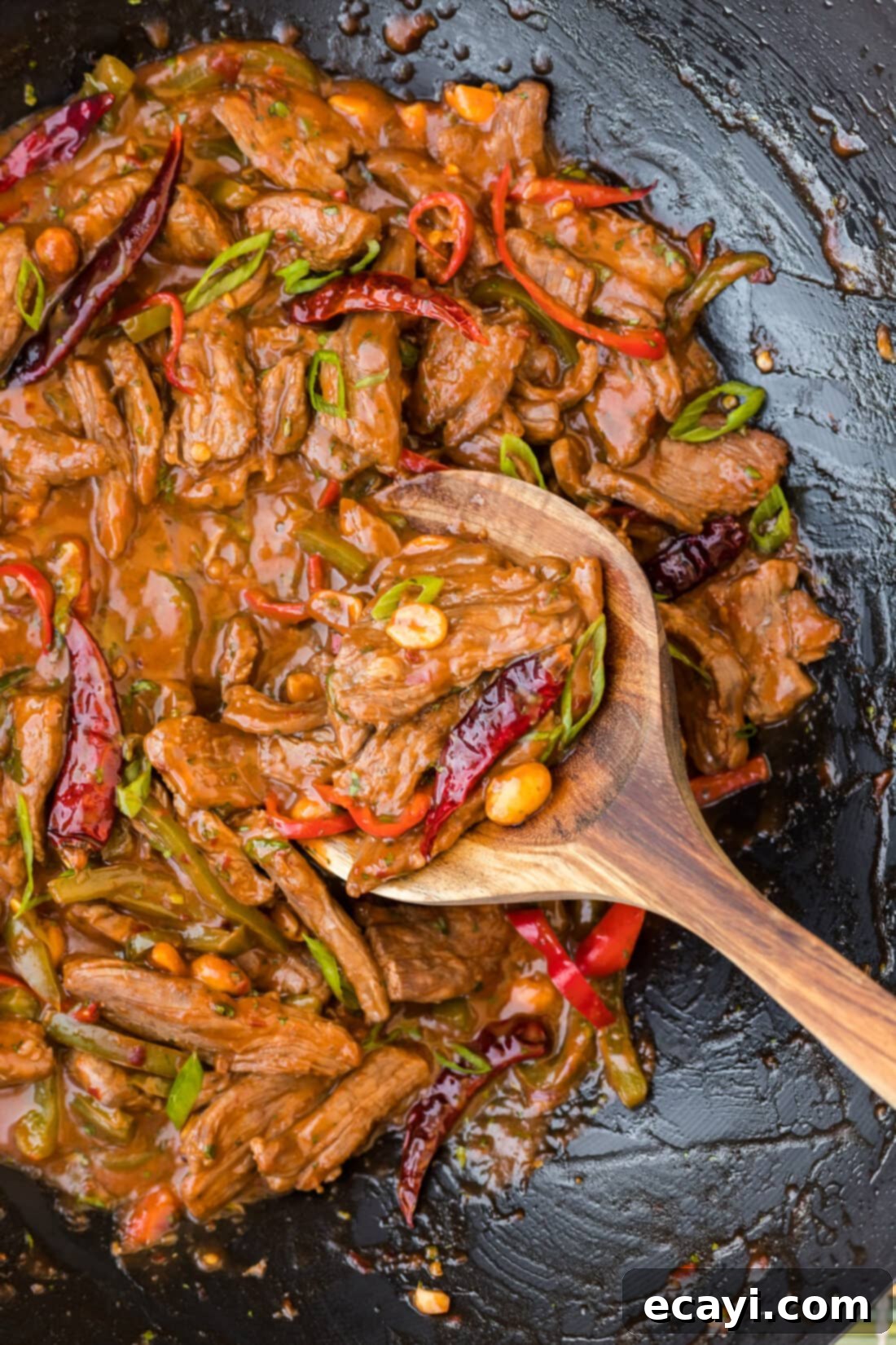 Fiery Szechuan Beef 2 Kung Pao Beef in a wok, sizzling with vegetables and sauce