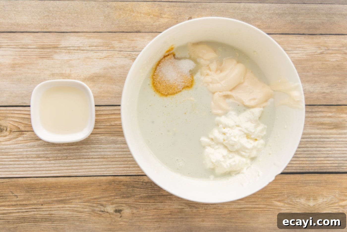 Classic Blue Cheese Dressing 6 Mayonnaise, sour cream, and other seasonings added to the buttermilk and blue cheese mixture, ready to be whisked into a dressing.