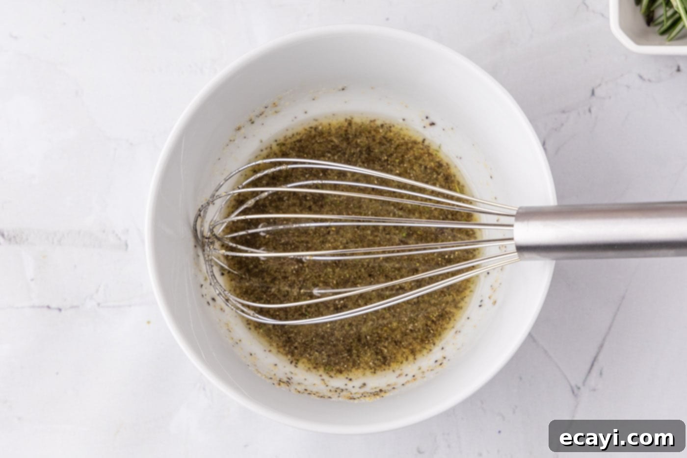 Meltingly Tender Sous Vide Pork Chops 5 whisked olive oil, garlic salt, and pepper