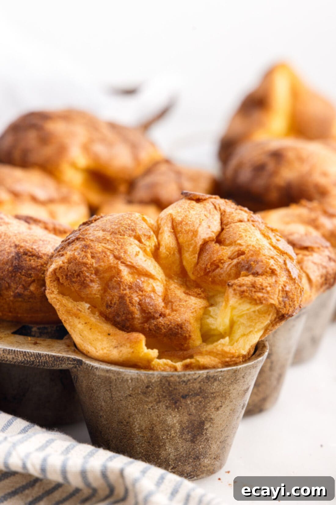 Light and Airy Popovers 2 Popovers in a pan, baked to golden perfection