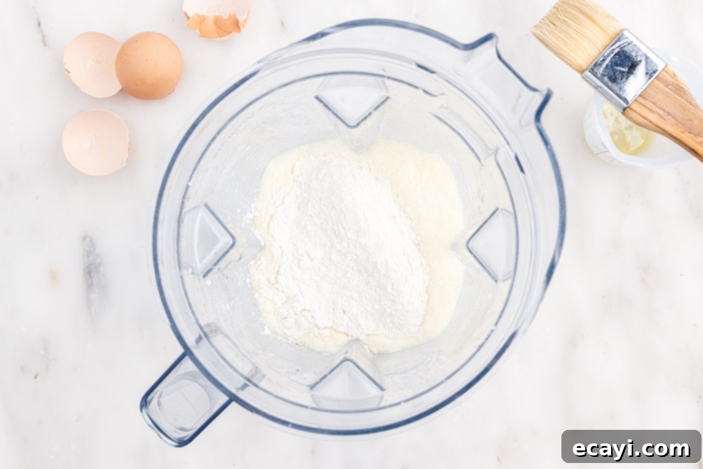 Light and Airy Popovers 6 Flour added to popover batter in a blender for final mixing