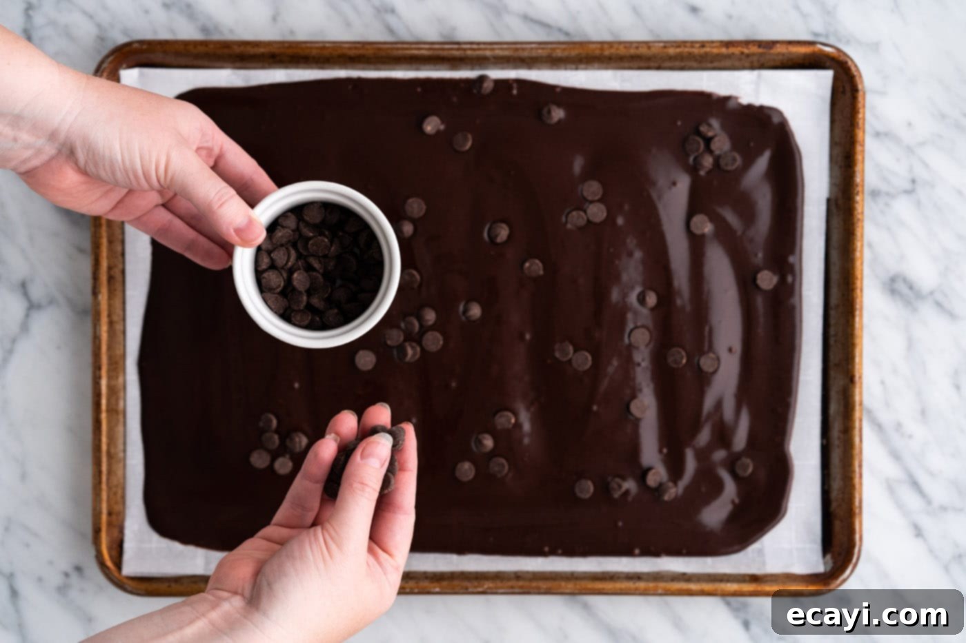 Brownie Bark 15 sprinkling chocolate chips over brownie brittle batter