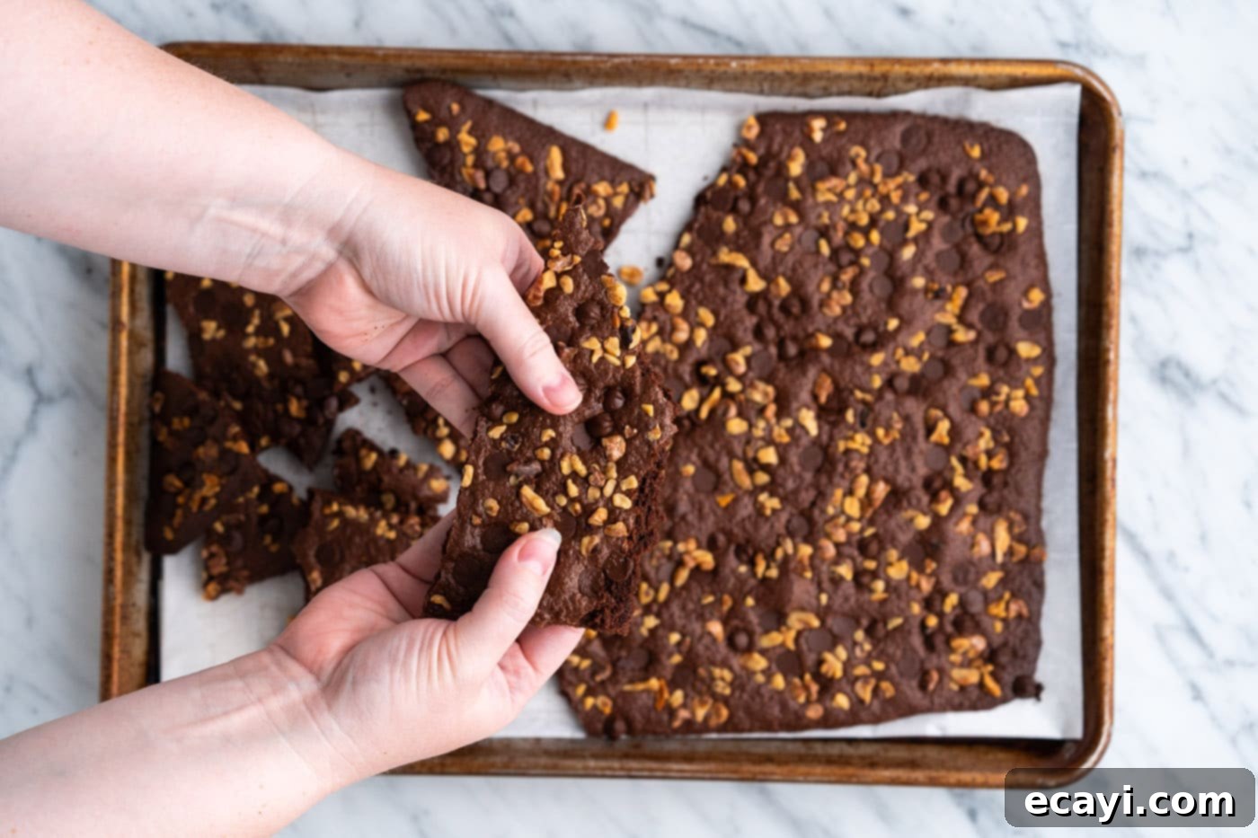 Brownie Bark 17 hands breaking apart brownie brittle