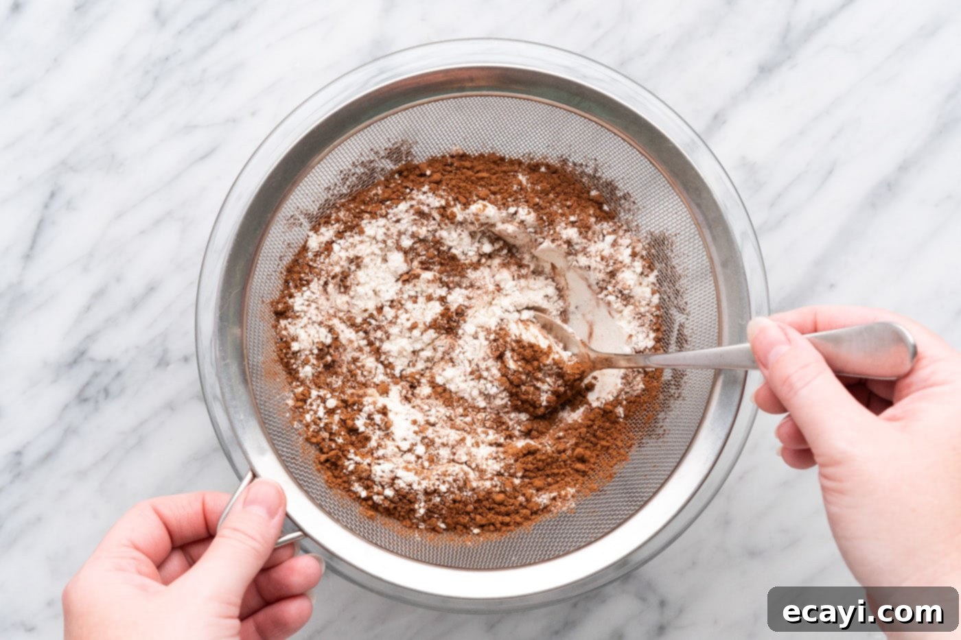 Brownie Bark 5 flour, cocoa powder, salt, and baking soda in a sieve