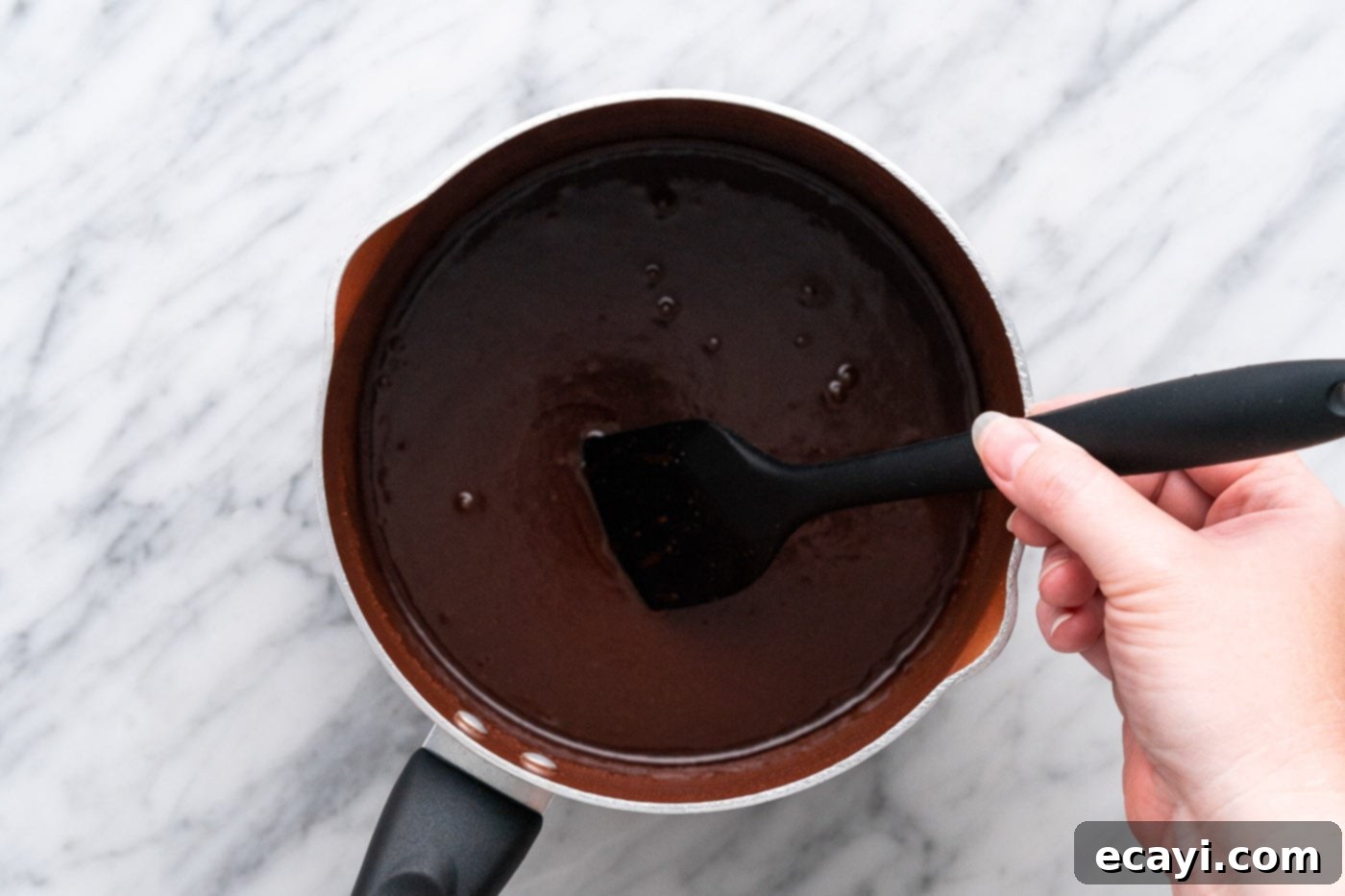 Brownie Bark 8 melted chocolate in a saucepan