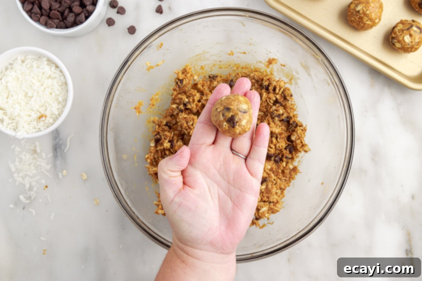Effortless Energy Bites 8 hand holding no bake energy ball