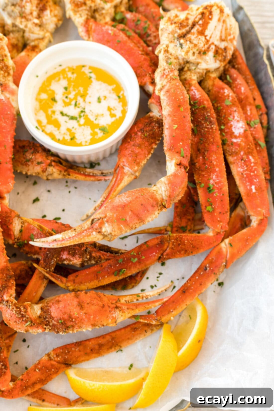 Arctic Crab Delights 3 Steamed Snow Crab Legs served with melted butter and lemon wedges