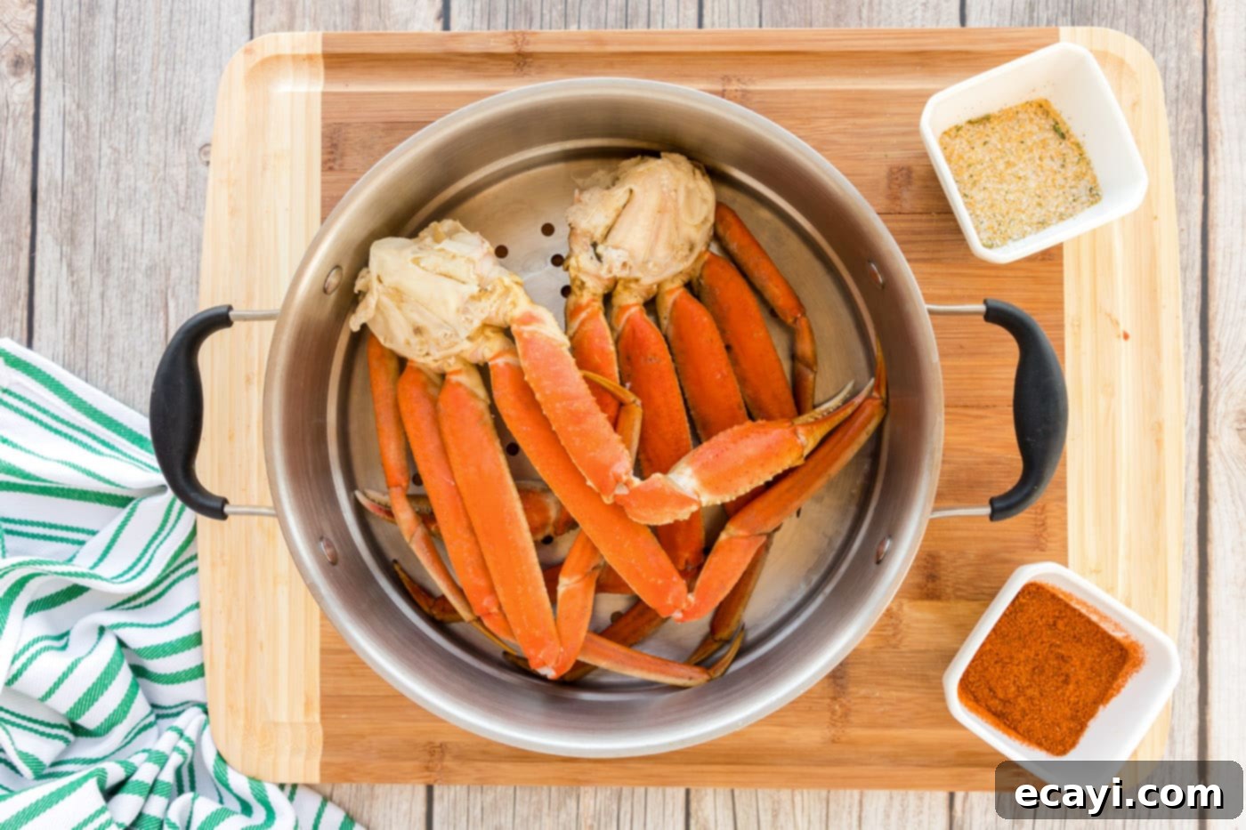 Arctic Crab Delights 5 Snow crab legs arranged in a steamer basket above water