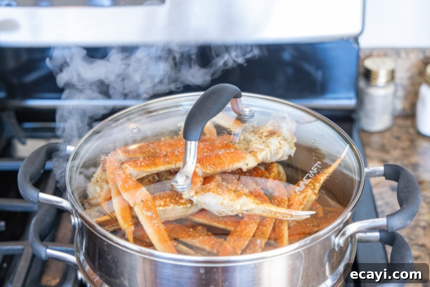 Arctic Crab Delights 9 Steam rising from snow crab legs in a steam pot, indicating they are cooked