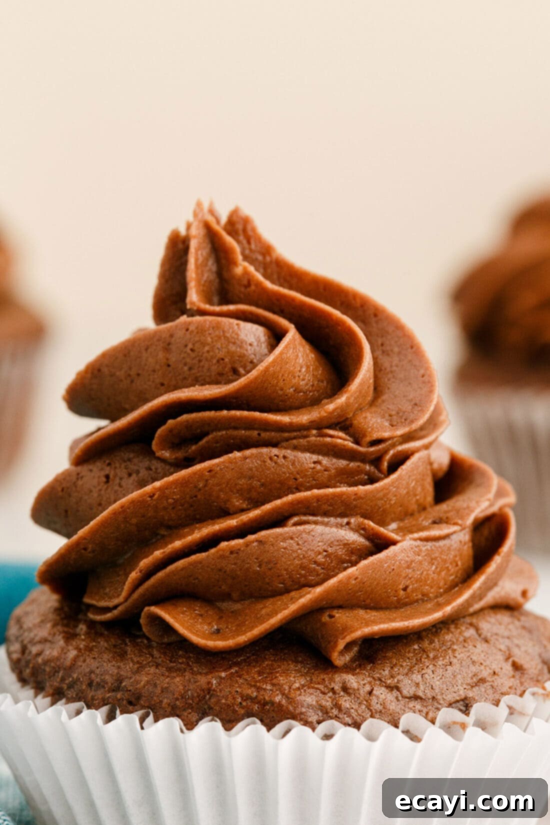 Velvety Chocolate Dream Frosting 10 close up of Chocolate Buttercream Frosting on cupcake