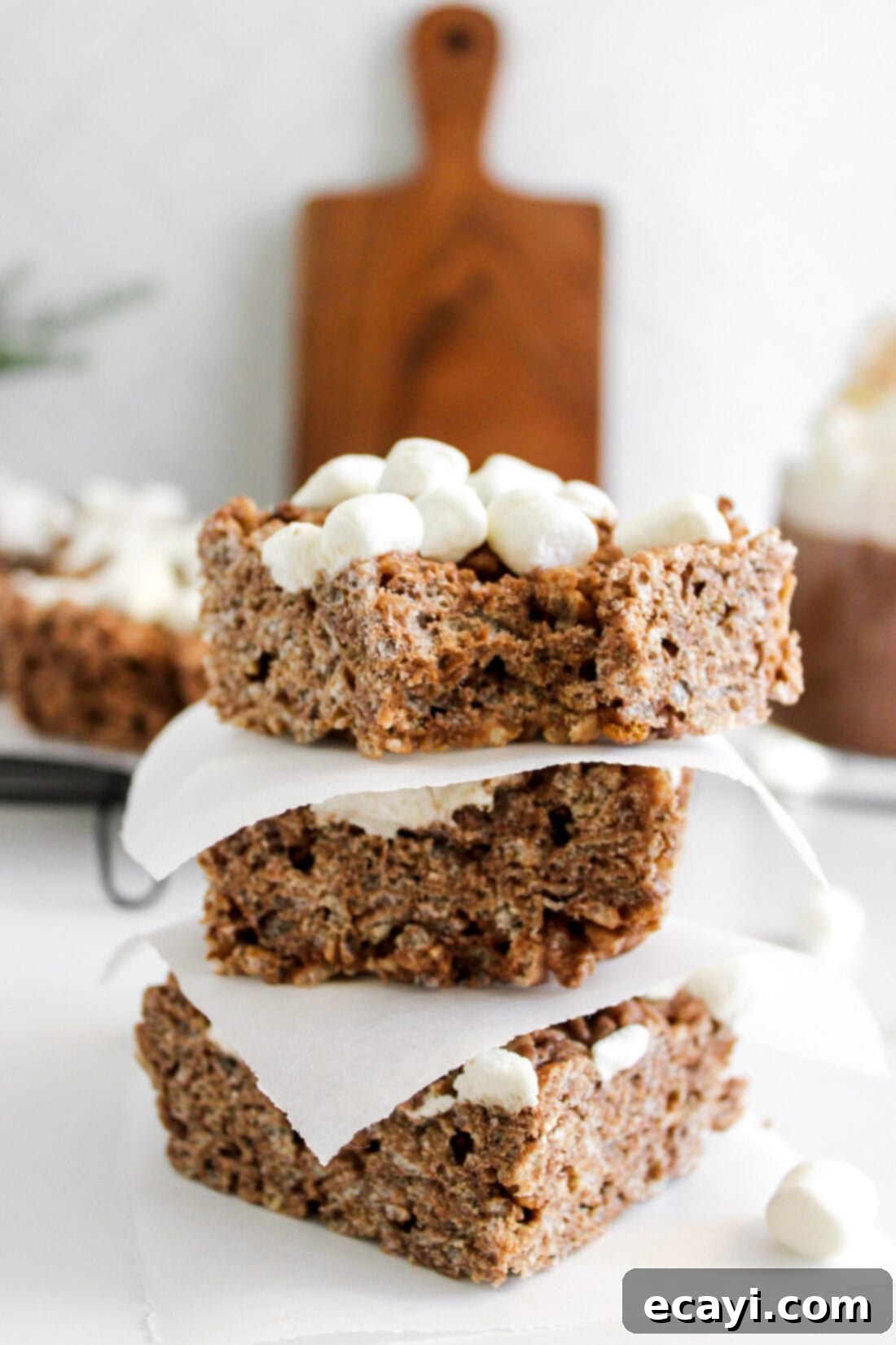 Cozy Cocoa Krispie Squares 12 stack of Hot Cocoa Rice Krispie Treats, showing the delicious layers and marshmallow topping