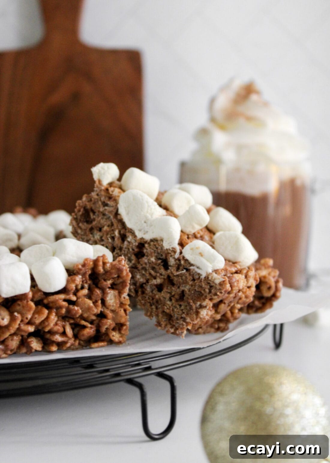 Cozy Cocoa Krispie Squares 3 plate of Hot Cocoa Rice Krispie Treats, perfectly cut and ready to serve