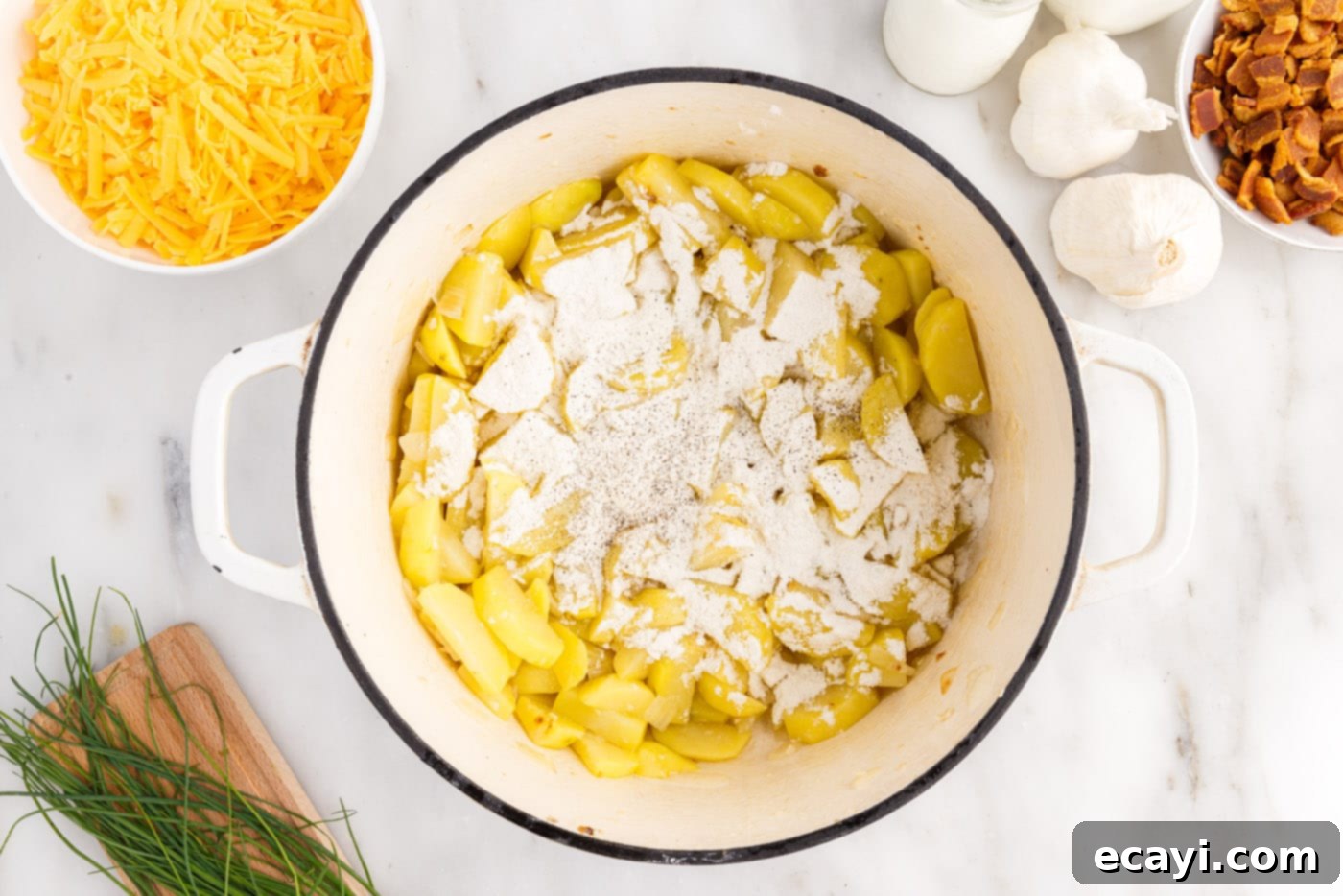 Loaded Baked Potato Soup 7 Sprinkling all-purpose flour, black pepper, and salt over the diced potatoes and aromatics in a stockpot to create a roux