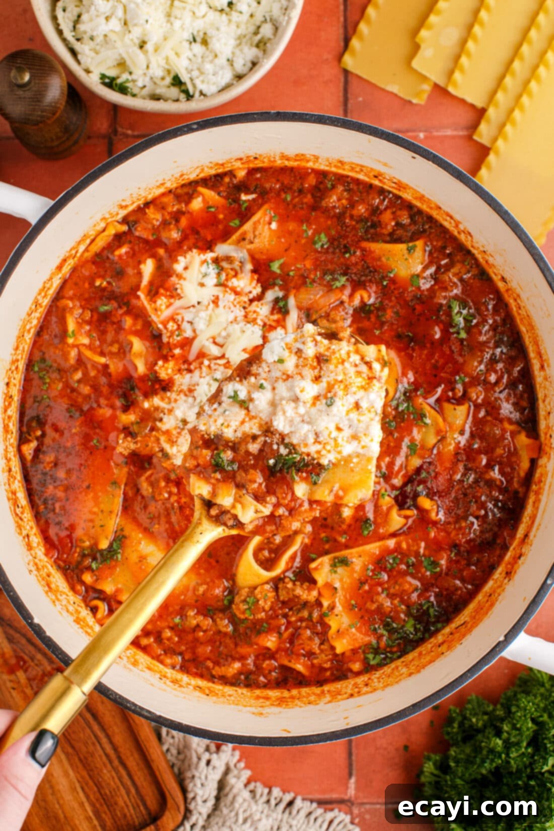 Deconstructed Lasagna Soup 2 Spoonful of Lasagna Soup over pot of Lasagna Soup