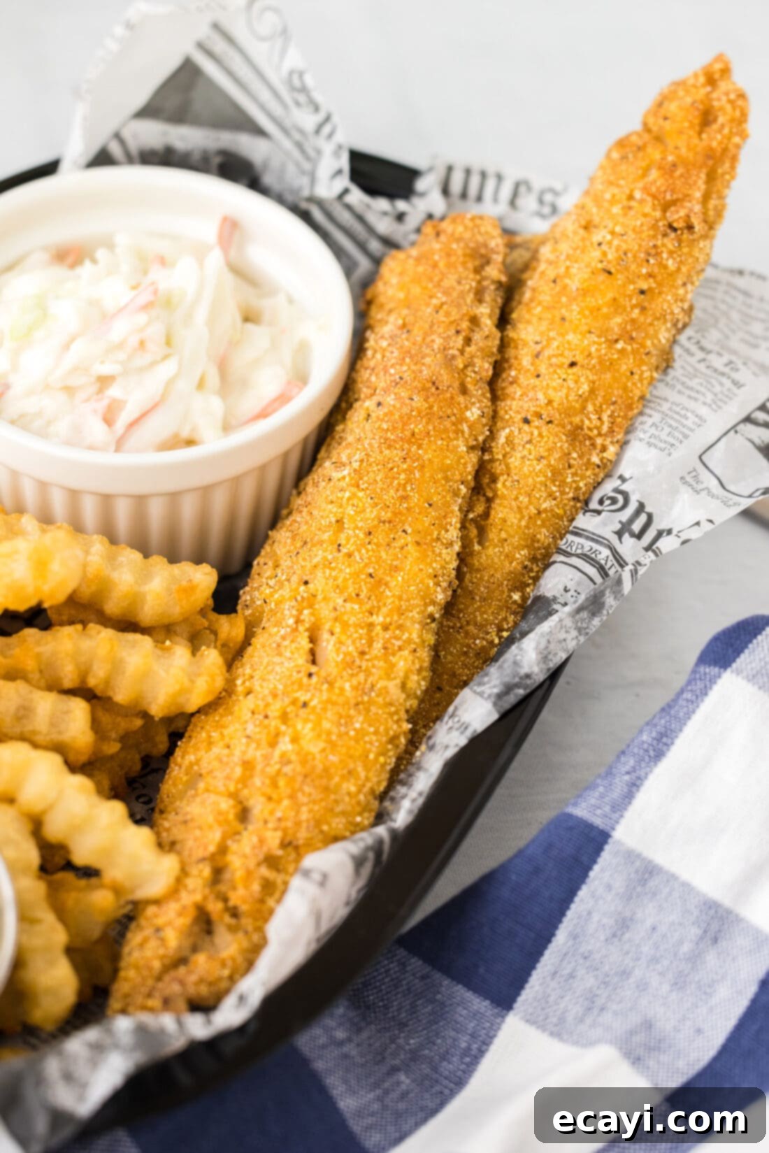 Crispy Fried Whiting 2 Fried Whiting Fish in a basket with fries
