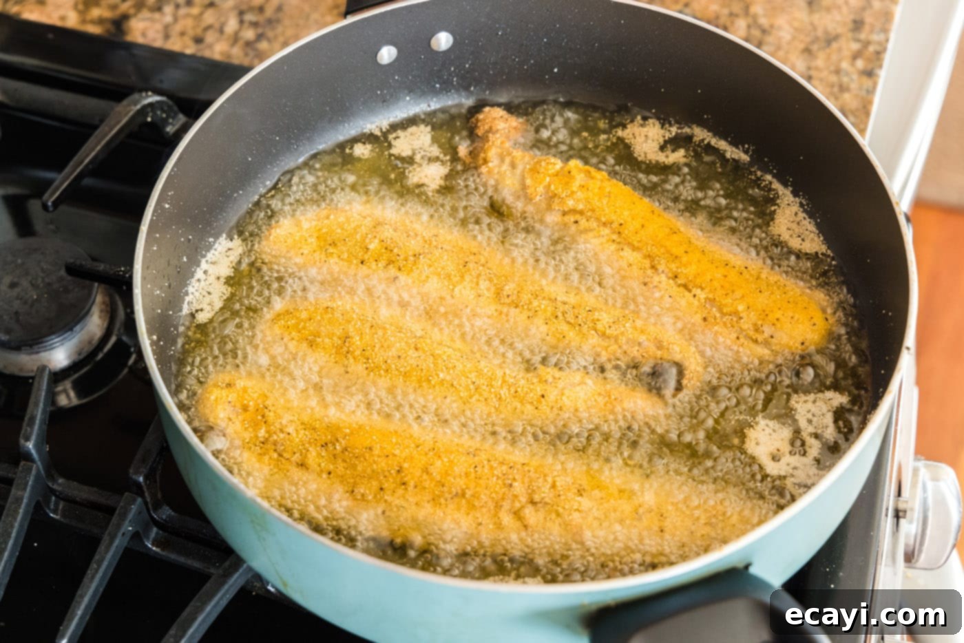 Crispy Fried Whiting 10 whiting fish frying in oil