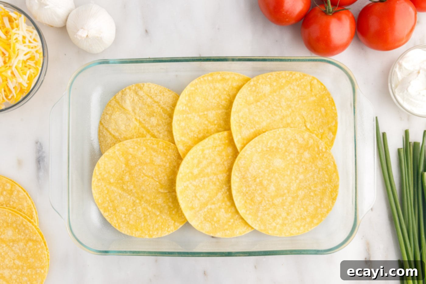 Tex-Mex Lasagna 10 First layer of corn tortillas in a baking dish