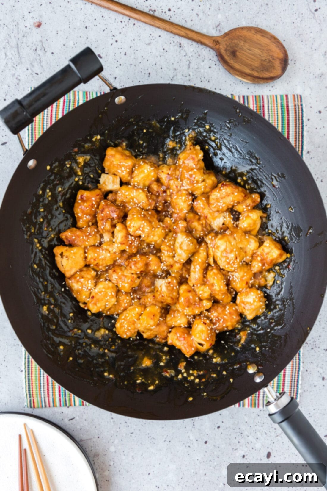Tangy Orange Crunch Chicken 2 Orange Chicken in a wok