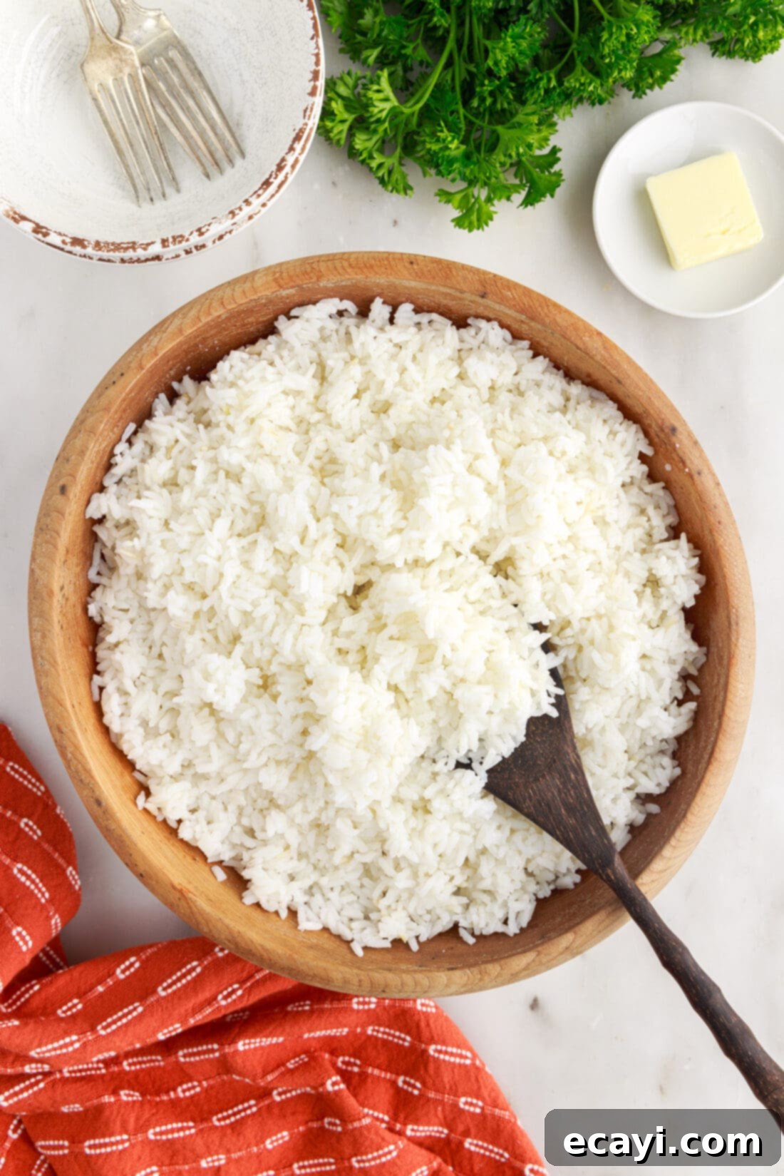 Perfect Fluffy Rice Every Time 14 Bowl of rice with a spoon ready to be eaten