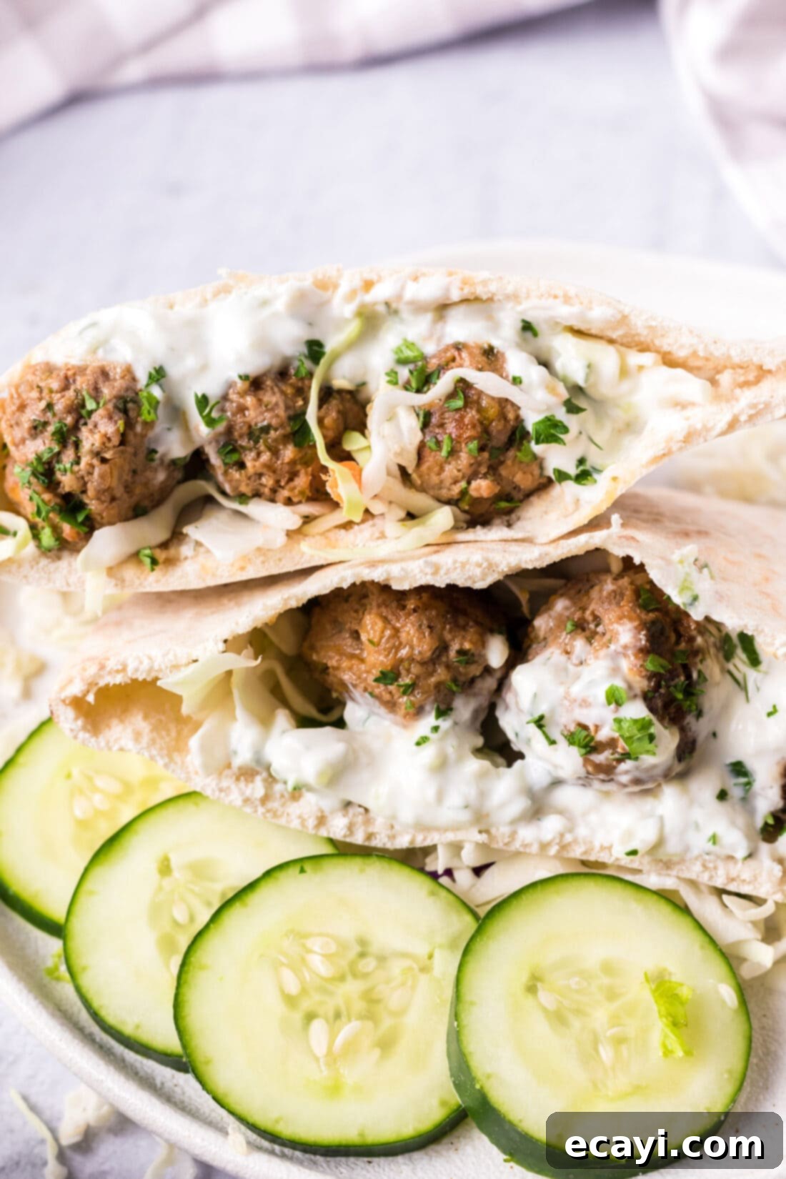 Aromatic Lamb Kofta 2 Lamb Meatballs in a pita pocket with tzatziki