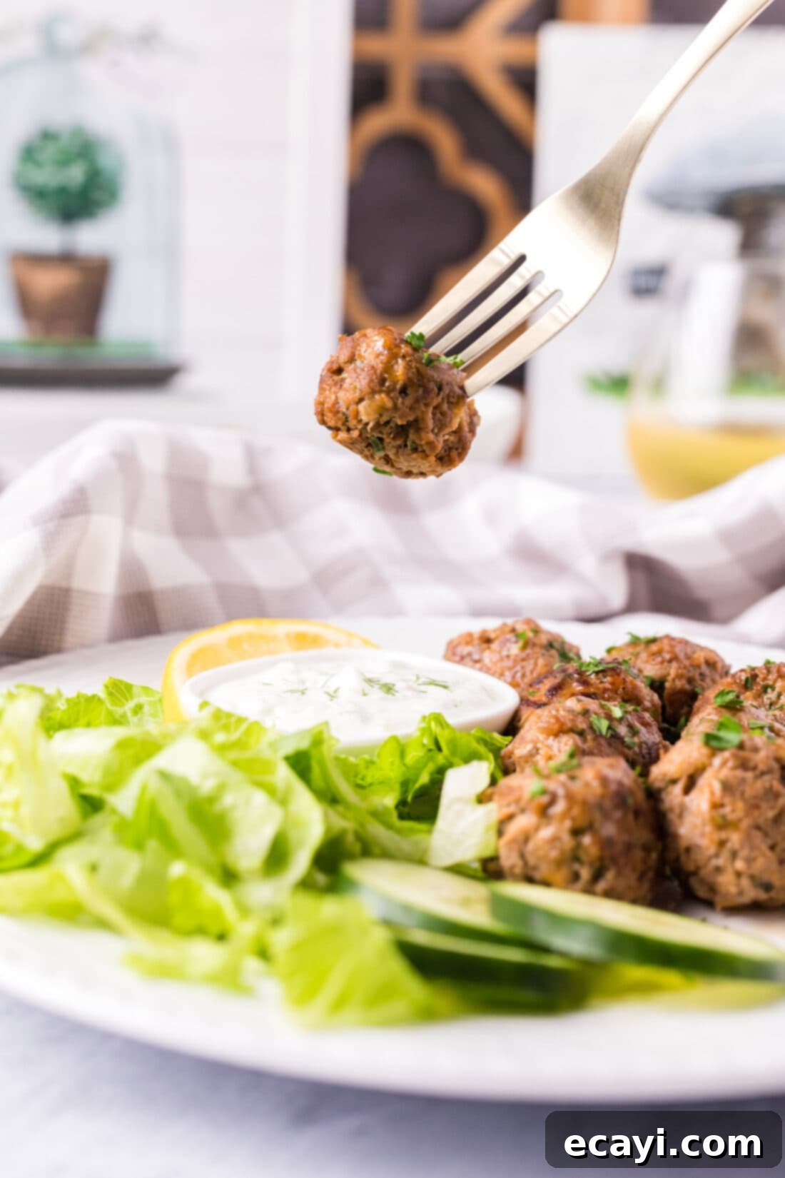 Aromatic Lamb Kofta 3 Lamb Meatball on a fork