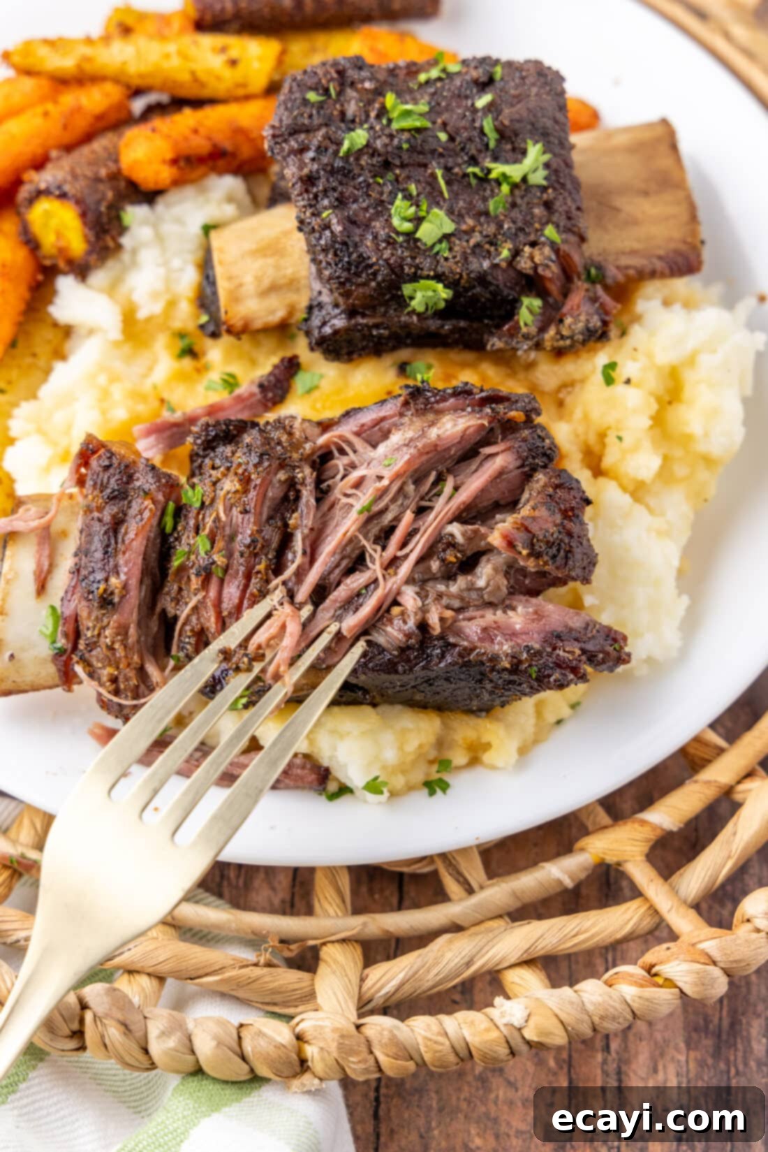 Slow-Cooked Beef Short Ribs 3 Close up of a Beef Short Rib pulled apart showing its tenderness