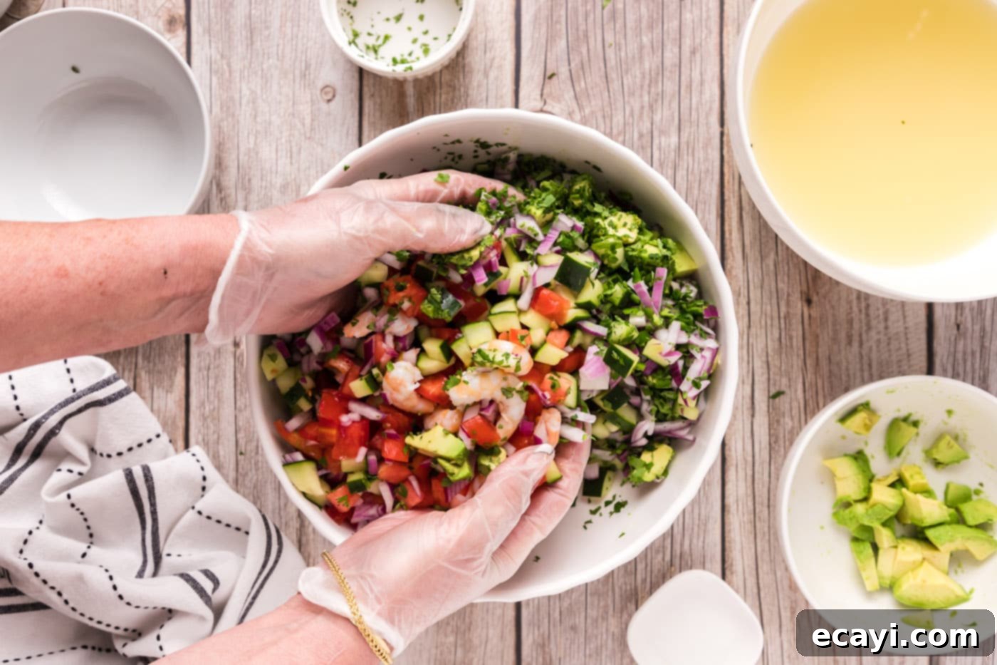 Zesty Lime Shrimp Ceviche 13 tossing shrimp ceviche in a bowl