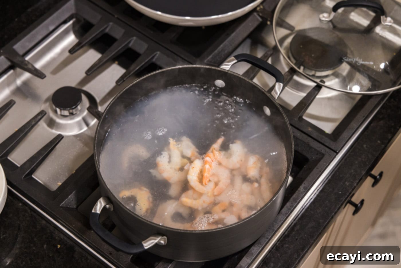 Zesty Lime Shrimp Ceviche 6 poaching shrimp in a pot