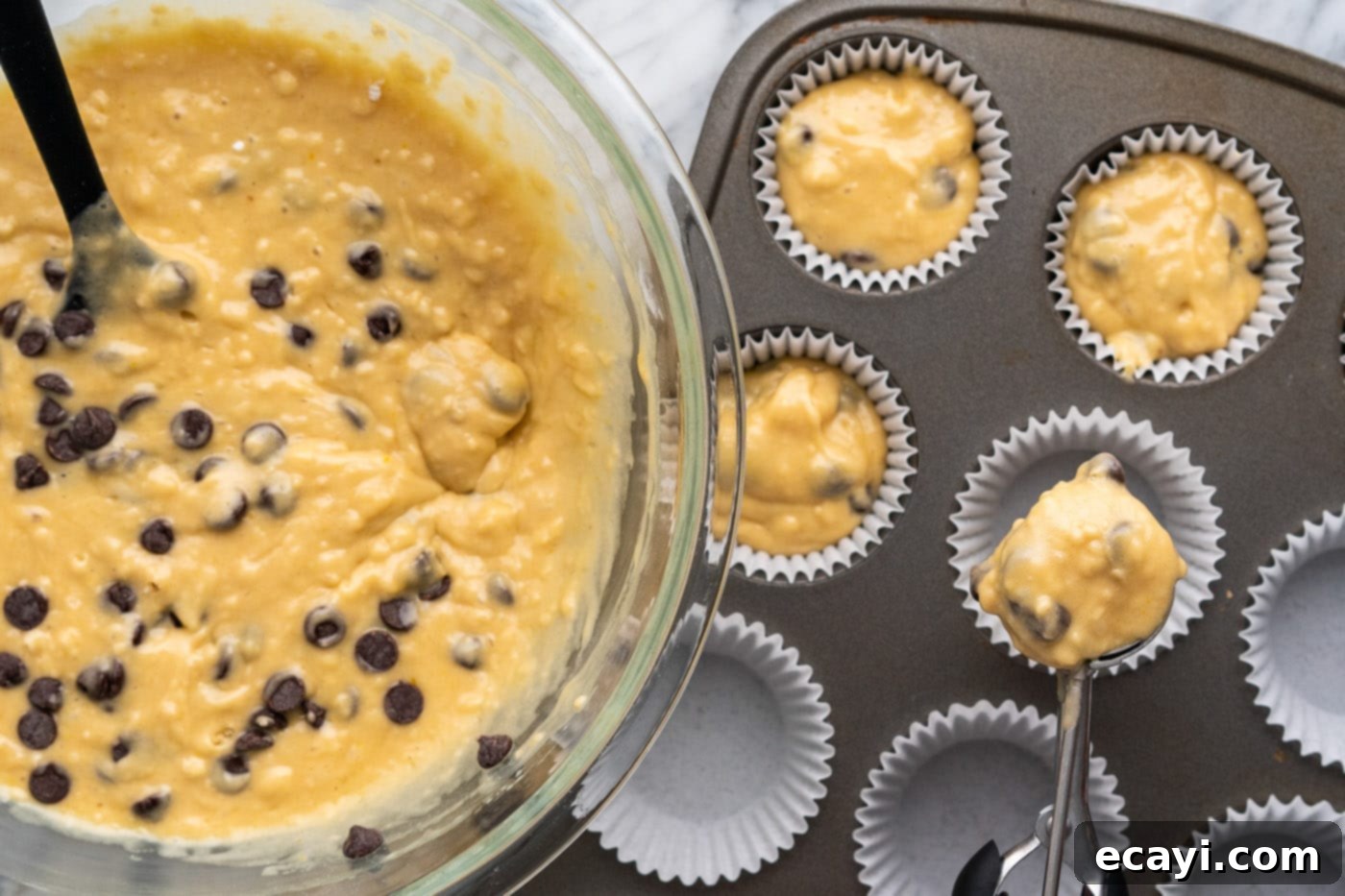 Heavenly Chocolate Chip Bites 13 adding batter to muffin pan with liners