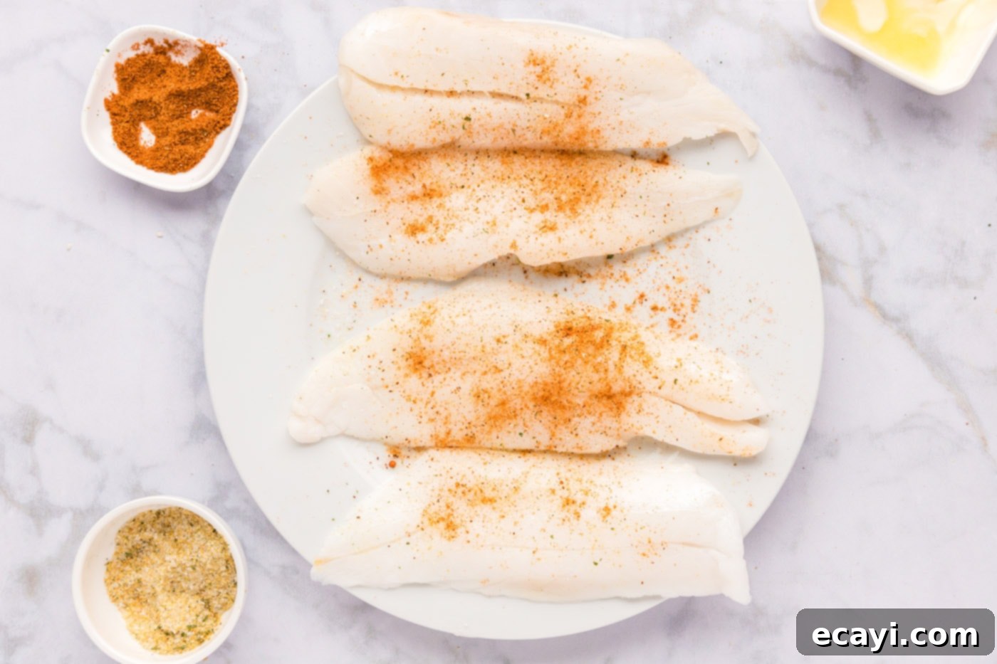 The Ageless Orange of the Depths 6 Orange roughy filets evenly coated with Old Bay seasoning and garlic salt