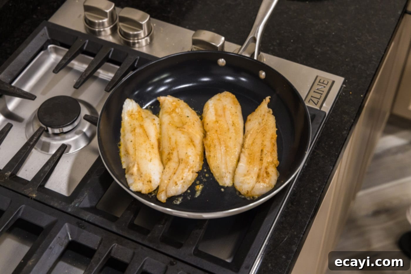 The Ageless Orange of the Depths 8 Pan-seared orange roughy cooking in a hot skillet, developing a golden crust