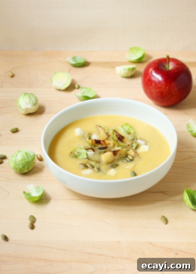 Autumn Glow Miso Squash Soup with Caramelized Sprouts and Crisp Apple 3 Recipe: Creamy Miso Squash Soup with Seared Brussels Sprouts and Apple (Dairy-Free, Vegan) // FoodNouveau.com