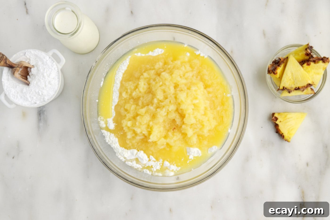 Tropical Pineapple Angel Delight 5 crushed pineapple and angel food cake mix in a bowl before mixing