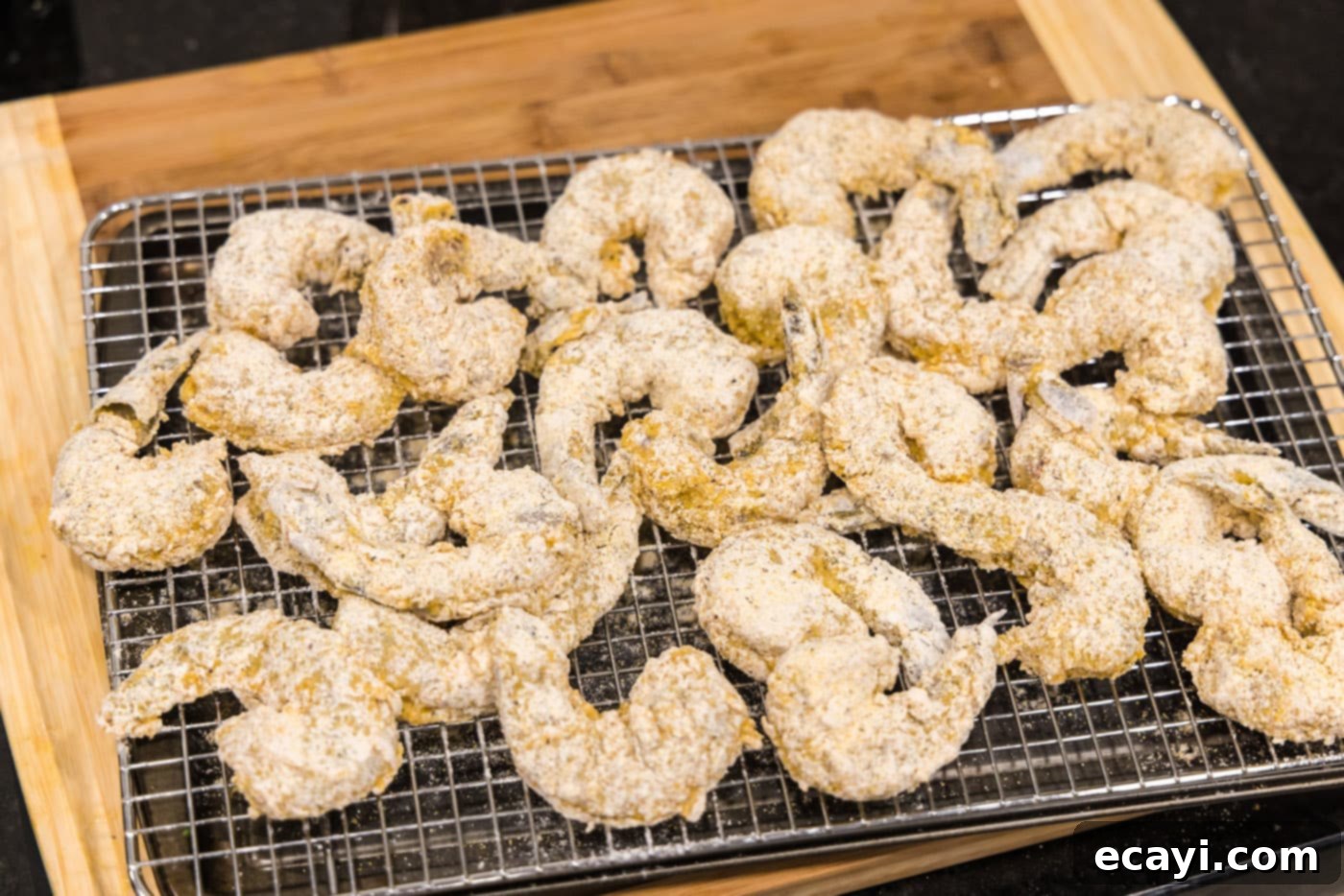 Golden Crispy Shrimp 11 breaded shrimp on a wire rack