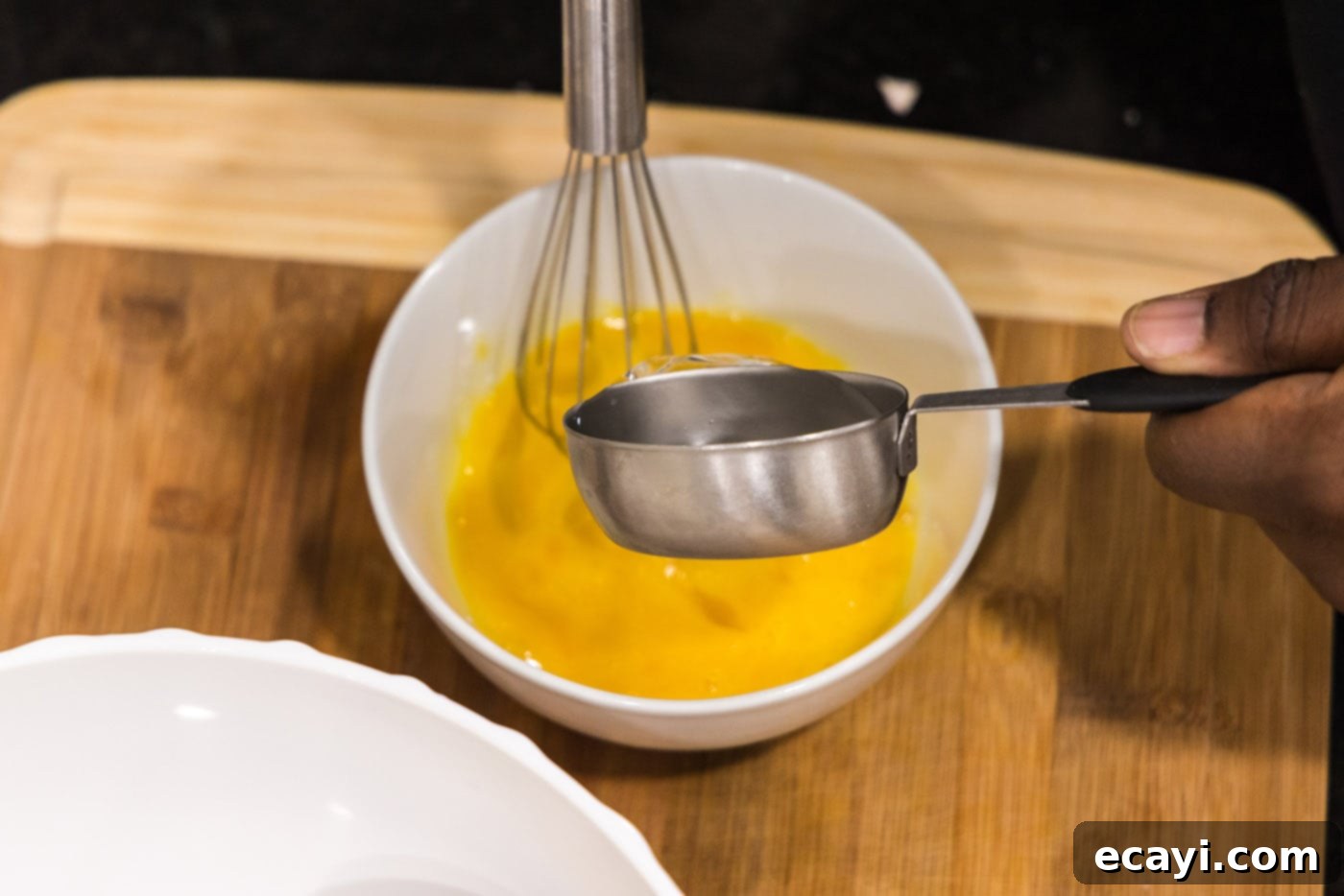 Golden Crispy Shrimp 5 adding water to bowl with whisked eggs