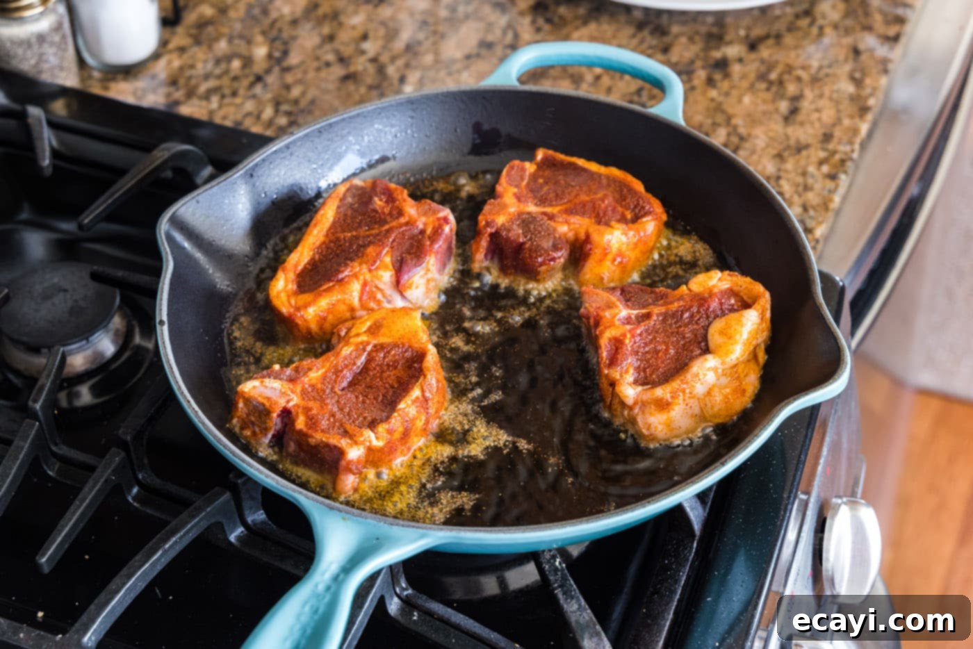 Seared Lamb Loin Chops 7 searing lamb chops in a skillet