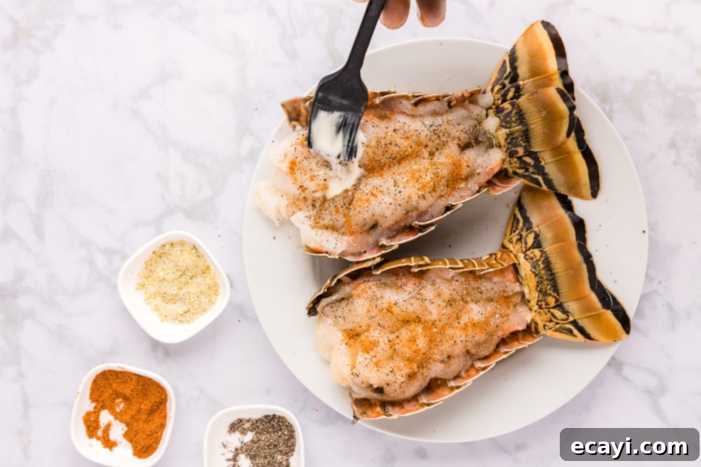 Succulent Grilled Lobster Tail 10 brushing seasoned lobster tail meat with butter