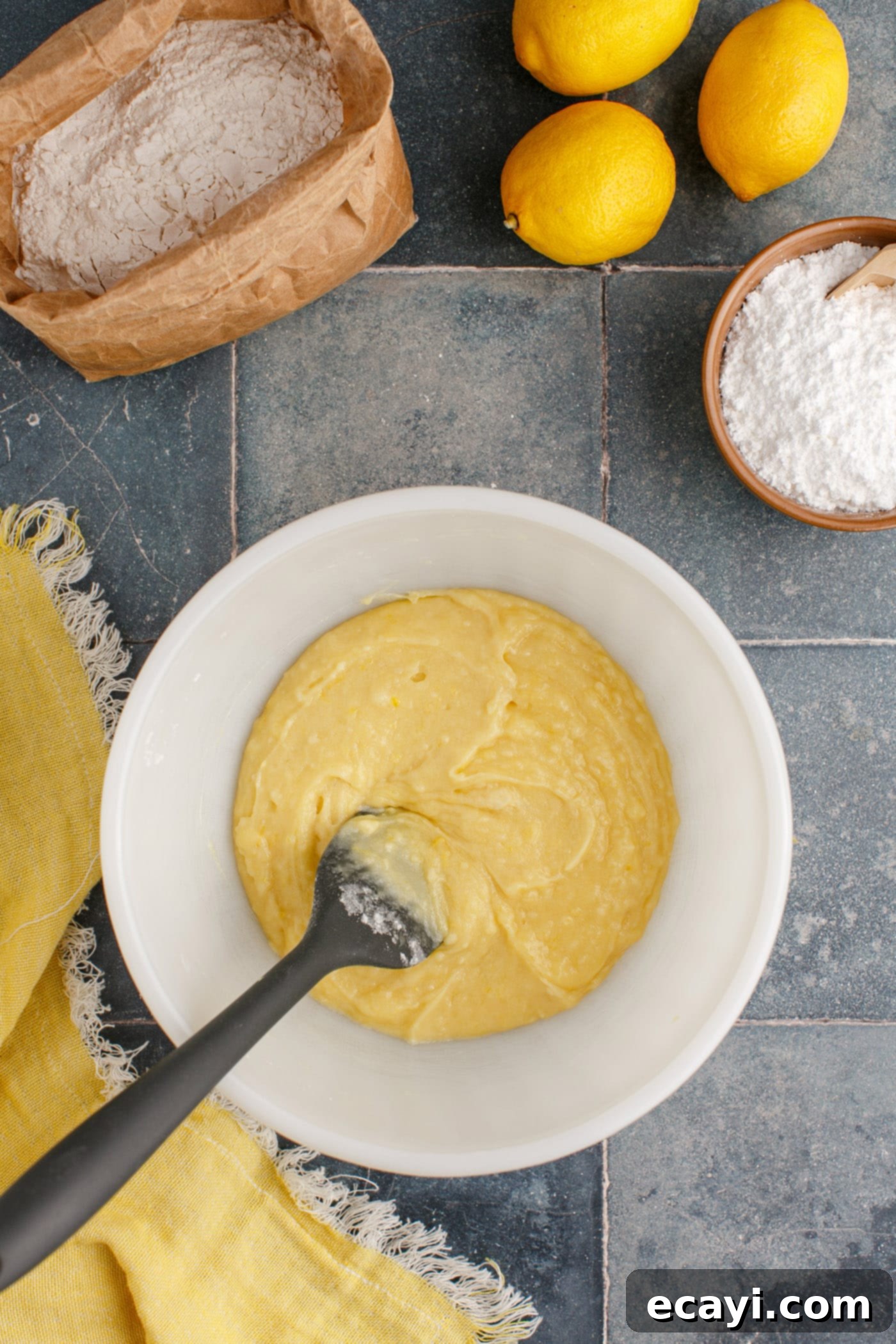 Sunshine Lemon Brownies 7 lemon brownie batter in a mixing bowl, ready to be poured