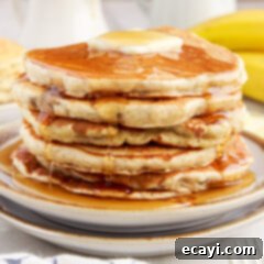 Fluffy Banana Bliss 14 Stack of Banana Pancakes with butter and syrup