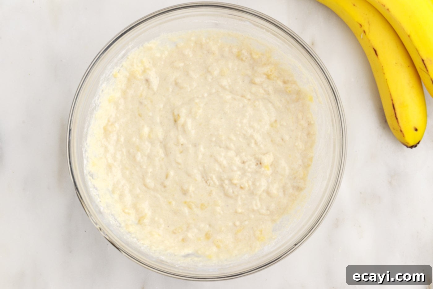 Fluffy Banana Bliss 10 Lumpy pancake batter with visible banana pieces in a bowl