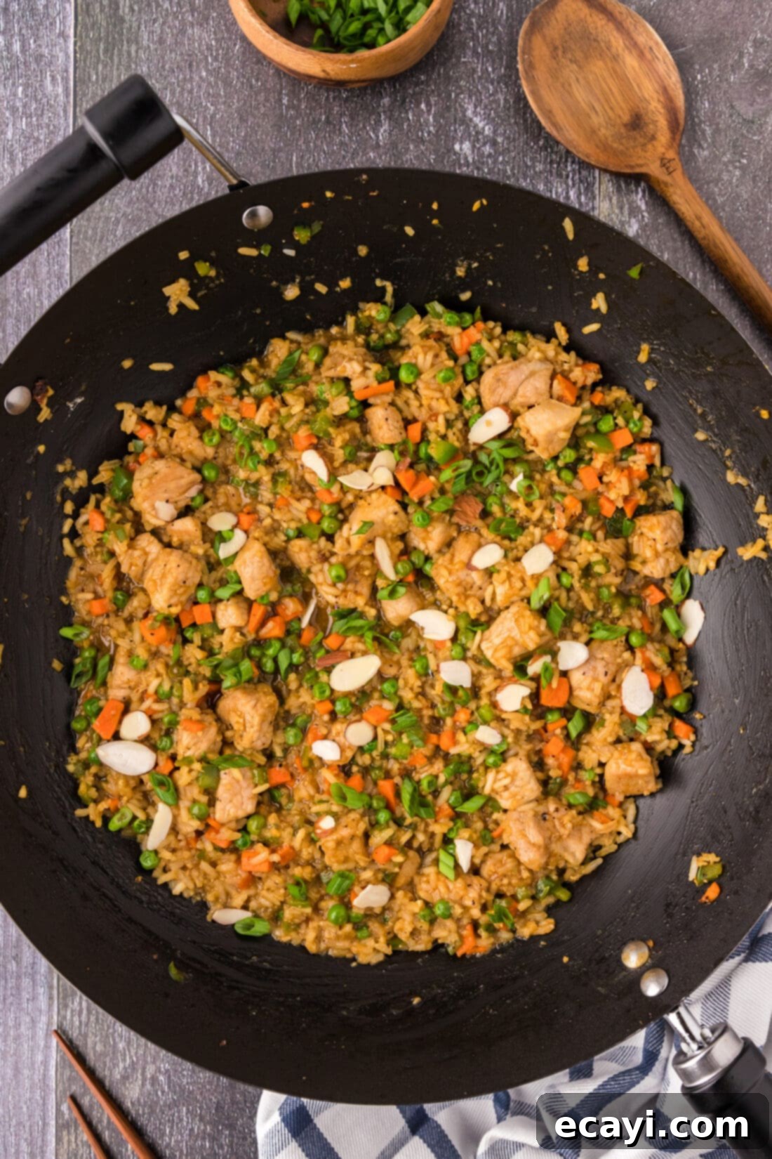 Wok-Fired Pork Fried Rice 2 Large skillet filled with vibrant Pork Fried Rice, garnished with fresh green onions