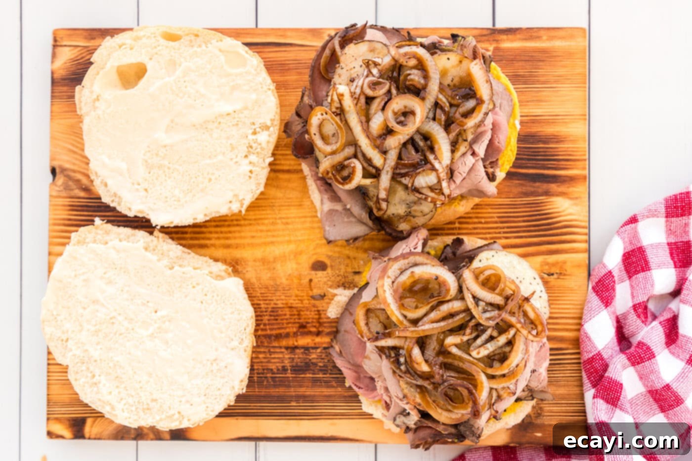 Tender Roast Beef Perfection 12 Layering balsamic glazed onions over the potatoes and roast beef