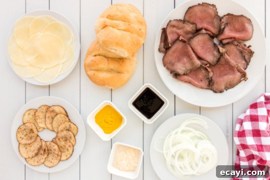 Tender Roast Beef Perfection 4 A flat lay of fresh ingredients laid out for making roast beef sandwiches
