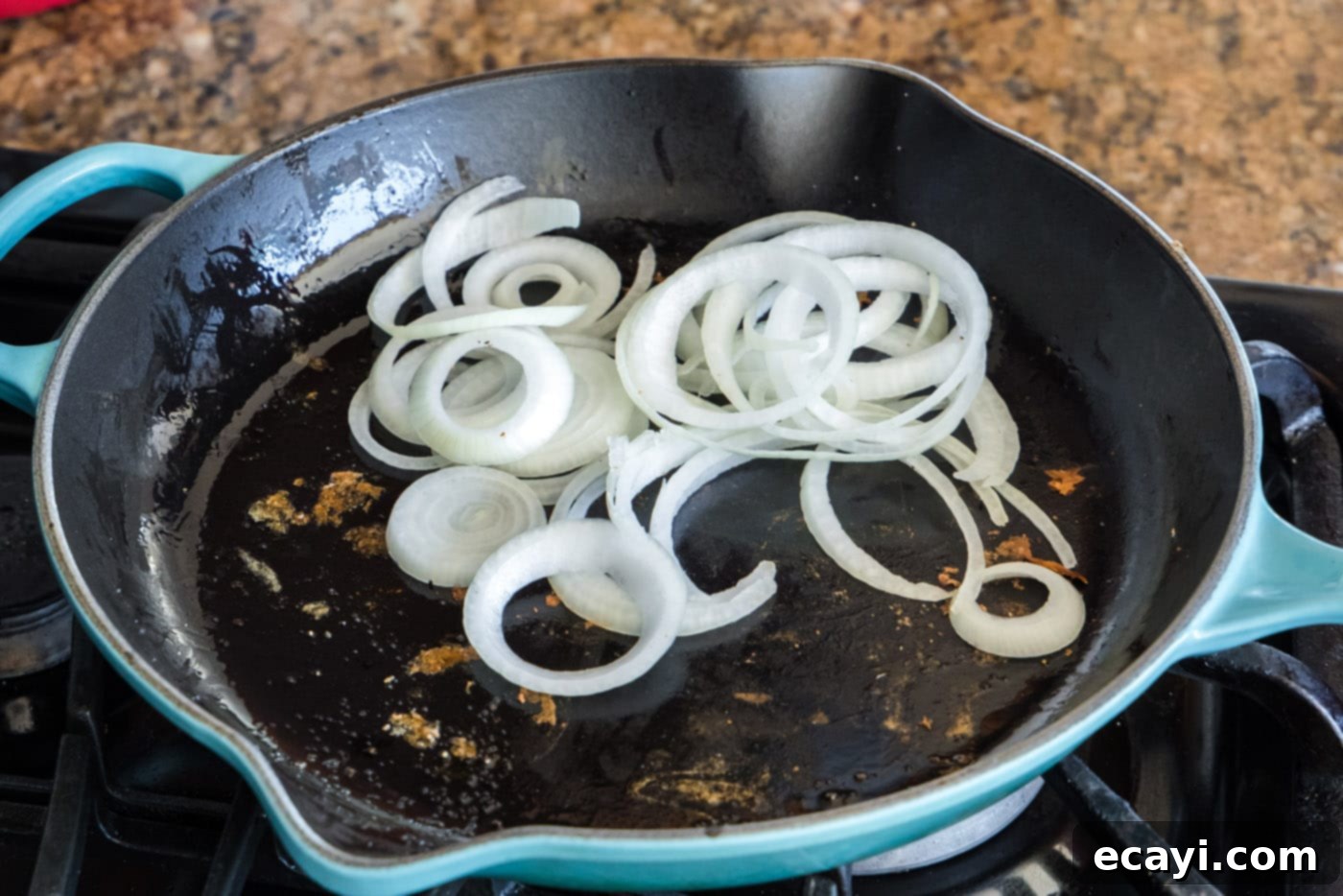 Tender Roast Beef Perfection 6 Sliced white onion sautéing in a skillet