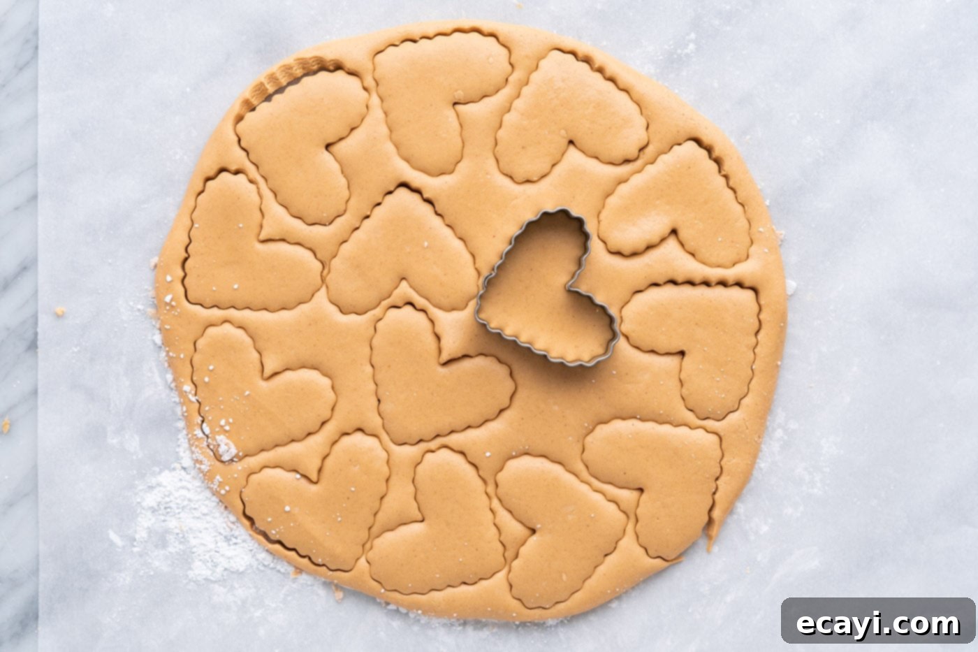 Decadent Chocolate Peanut Butter Hearts 10 stamping hearts with a cookie cutter into peanut butter dough