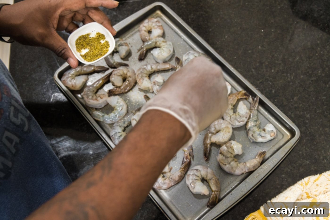 Sizzling Garlic Butter Shrimp 6 Sprinkling lemon pepper over shrimp for seasoning