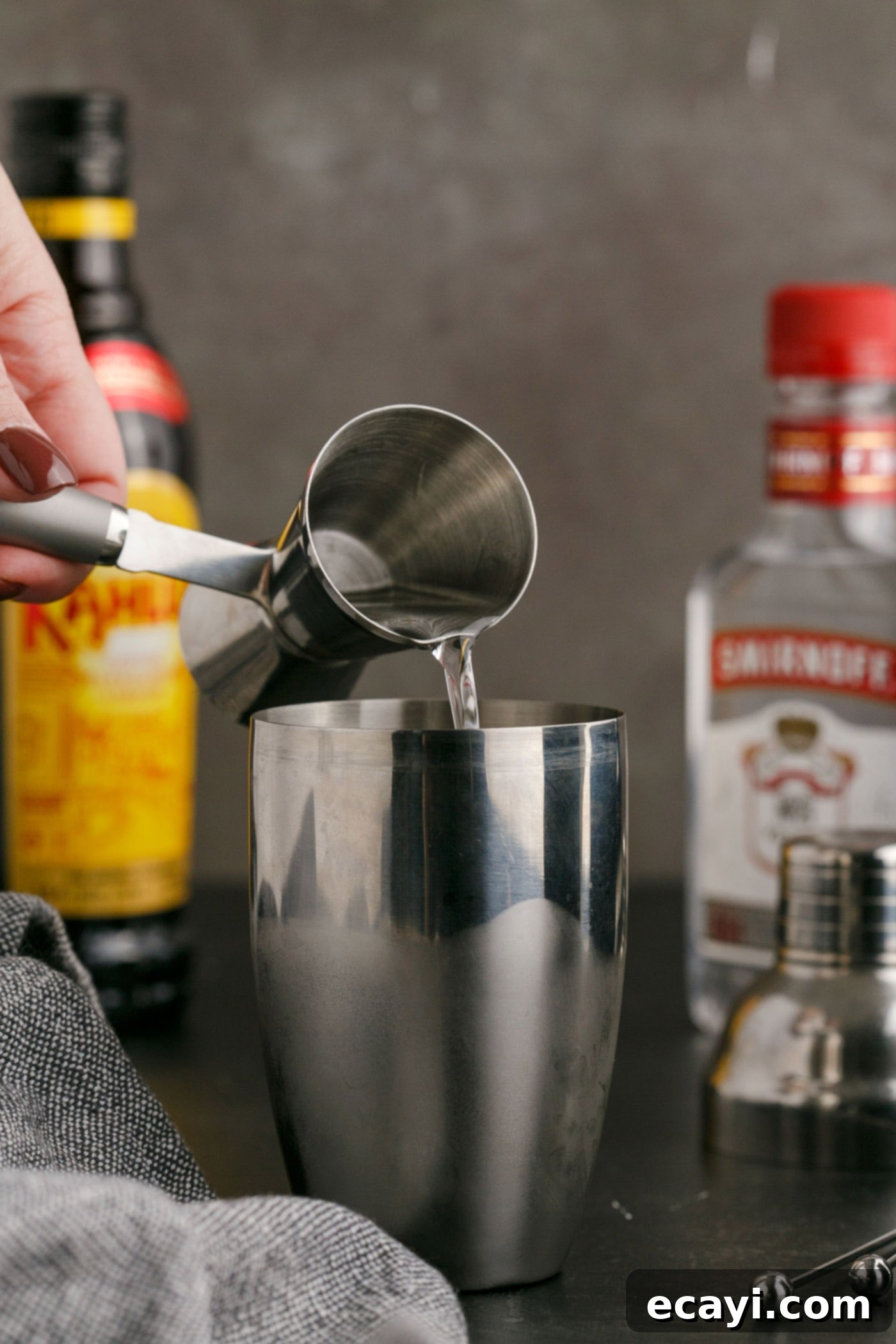 Siberian Night 6 pouring vodka into cocktail shaker