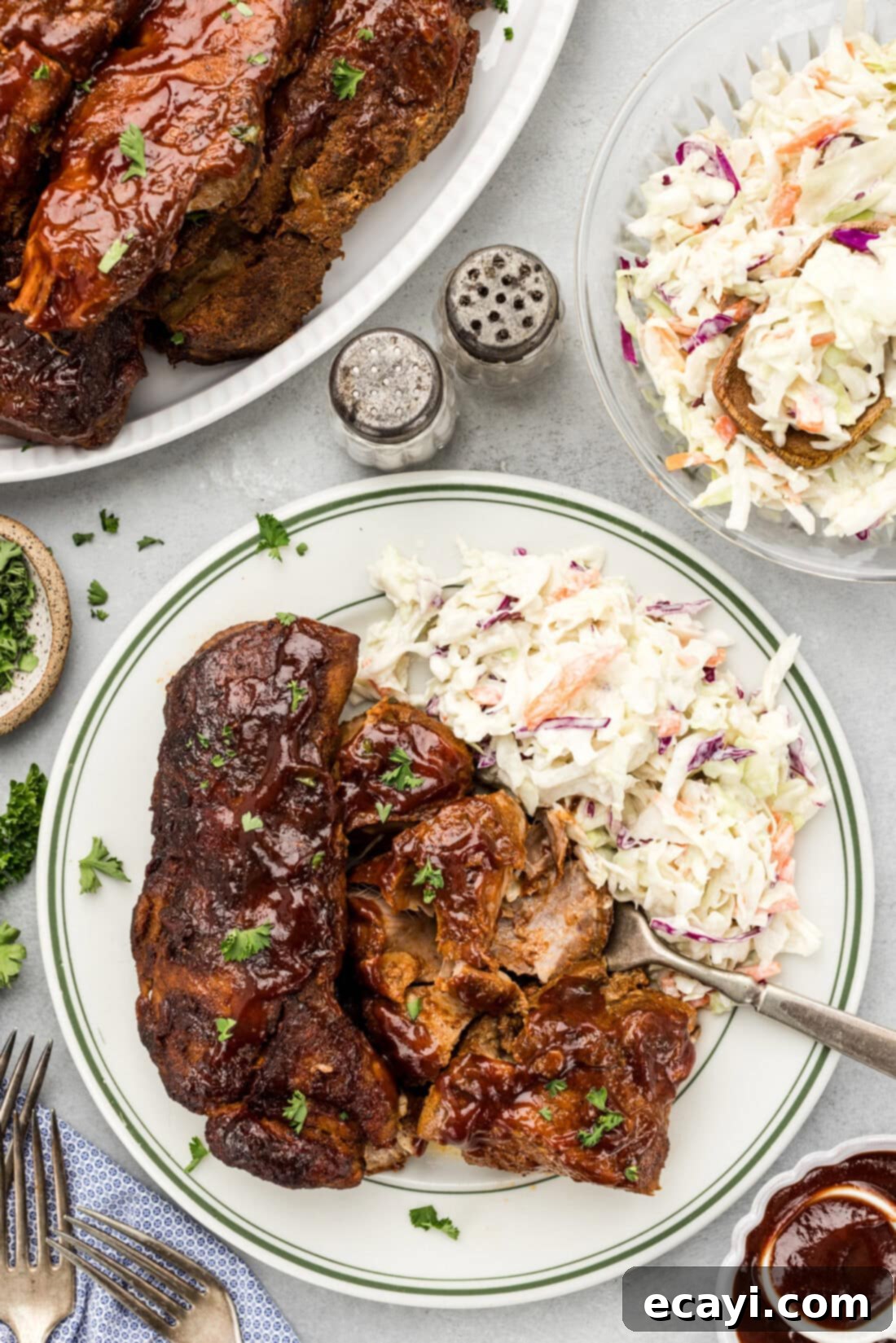 Fall-Off-The-Bone Slow Cooker BBQ Country Ribs 2 Slow Cooker Barbecued Country Style Ribs plated with coleslaw