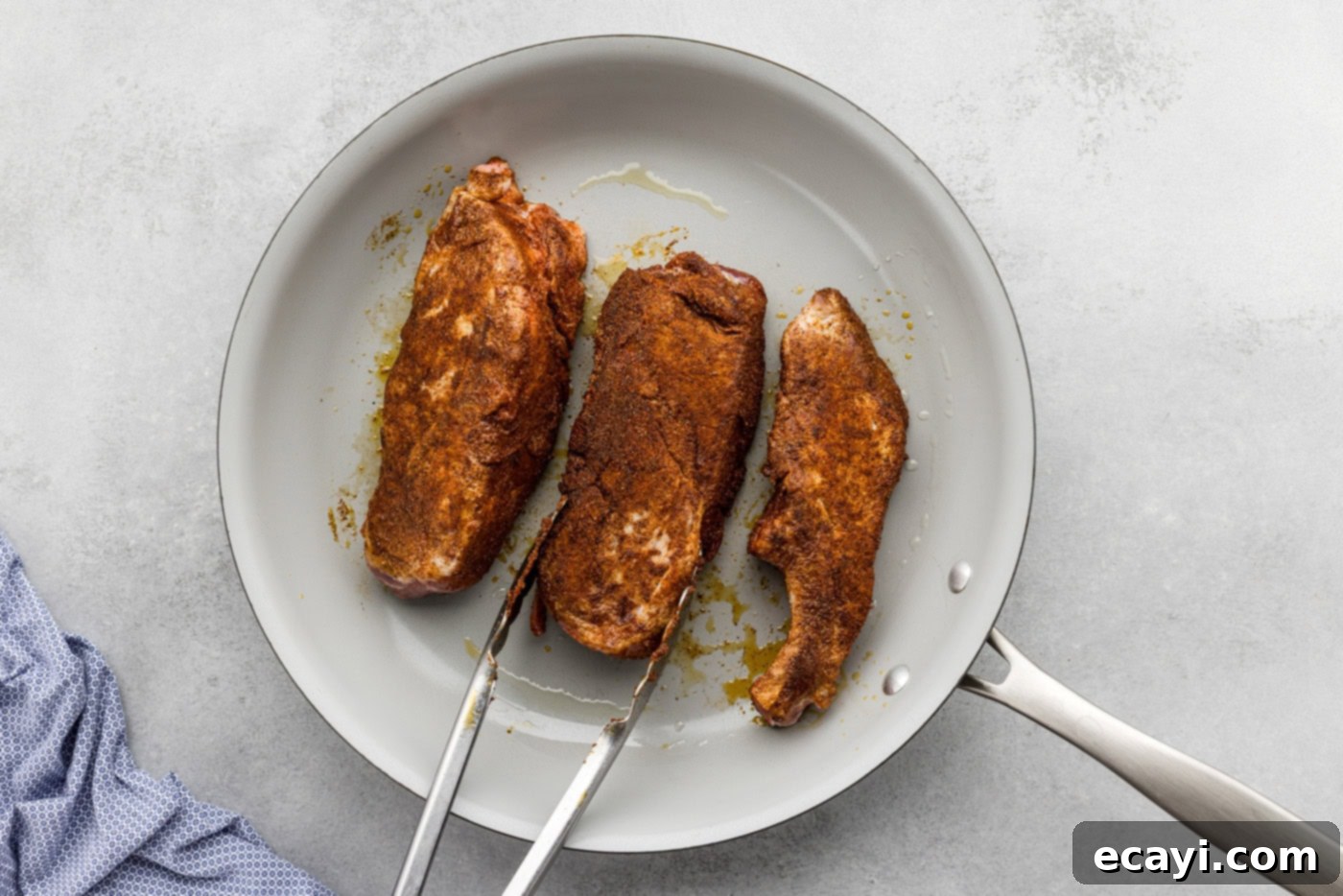 Fall-Off-The-Bone Slow Cooker BBQ Country Ribs 8 searing country style ribs in a skillet